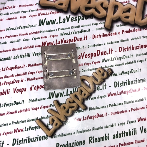 Protector PIAGGIO GENOVA específico para faros bajos VESPA 125 VN1T VN2T. Fijación con grapas de 38 mm x 49 mm. Fabricación artesanal italiana.