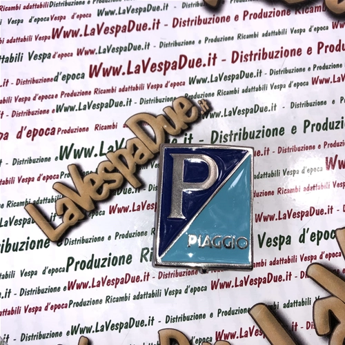 Protector PIAGGIO GENOVA específico para faros bajos VESPA 125 VN1T VN2T. Fijación con grapas de 38 mm x 49 mm. Fabricación artesanal italiana.