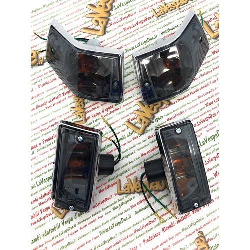 Set of 4 chrome front and rear turn signals with smoked black lenses complete with bulbs for VESPA 80 125 150 200 PX PE ARCOBALENO - APPROVED PRODUCT