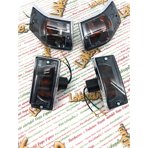 Set of 4 chrome front and rear turn signals with smoked black lenses complete with bulbs for VESPA 80 125 150 200 PX PE ARCOBALENO - APPROVED PRODUCT