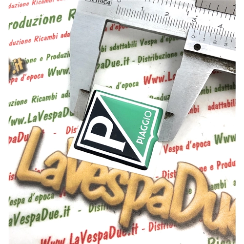 Pequeño escudo frontal de resina PIAGGIO para VESPA 50 NLR 90, tamaño mm. 25x30