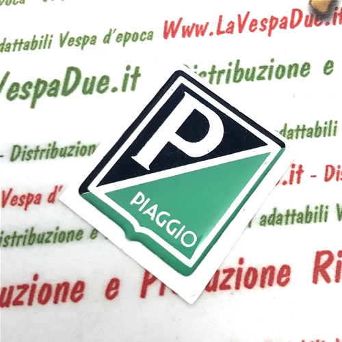 Pequeño escudo frontal de resina PIAGGIO para VESPA 50 NLR 90, tamaño mm. 25x30
