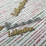 Inscription avant en aluminium, trois ergots de 140 mm pour Vespa 50 Special première série (1969-1972). Produit italien en fonte artisanale.