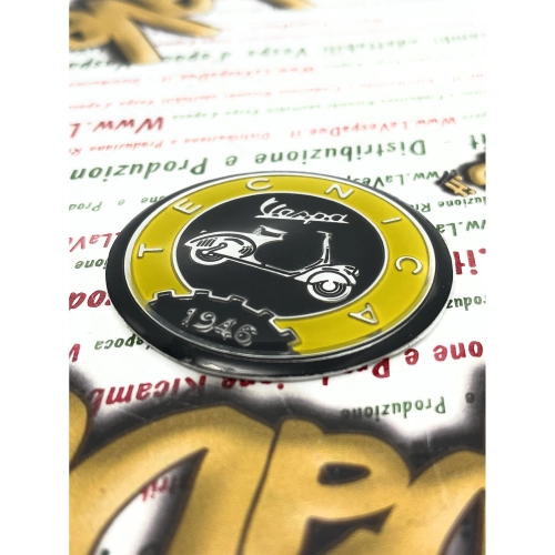 Resin shield Ø 53 mm on aluminum base Vintage aluminum logo emblem VESPA TECNICA 1946 yellow and black to be applied on VESPA accessories with adhesive to be glued Ø 53 mm