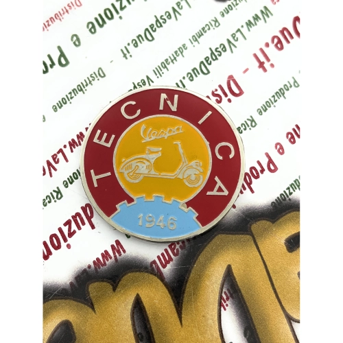 Ø 41 mm shield, Vintage logo emblem in aluminum VESPA TECNICA 1946, yellow and red, to be applied on VESPA accessories with adhesive to be glued Ø 41 mm